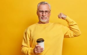 Man with coffee cup representing LifeRing Sober After Sixty Meeting