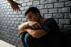 Image of someone helping another in crisis