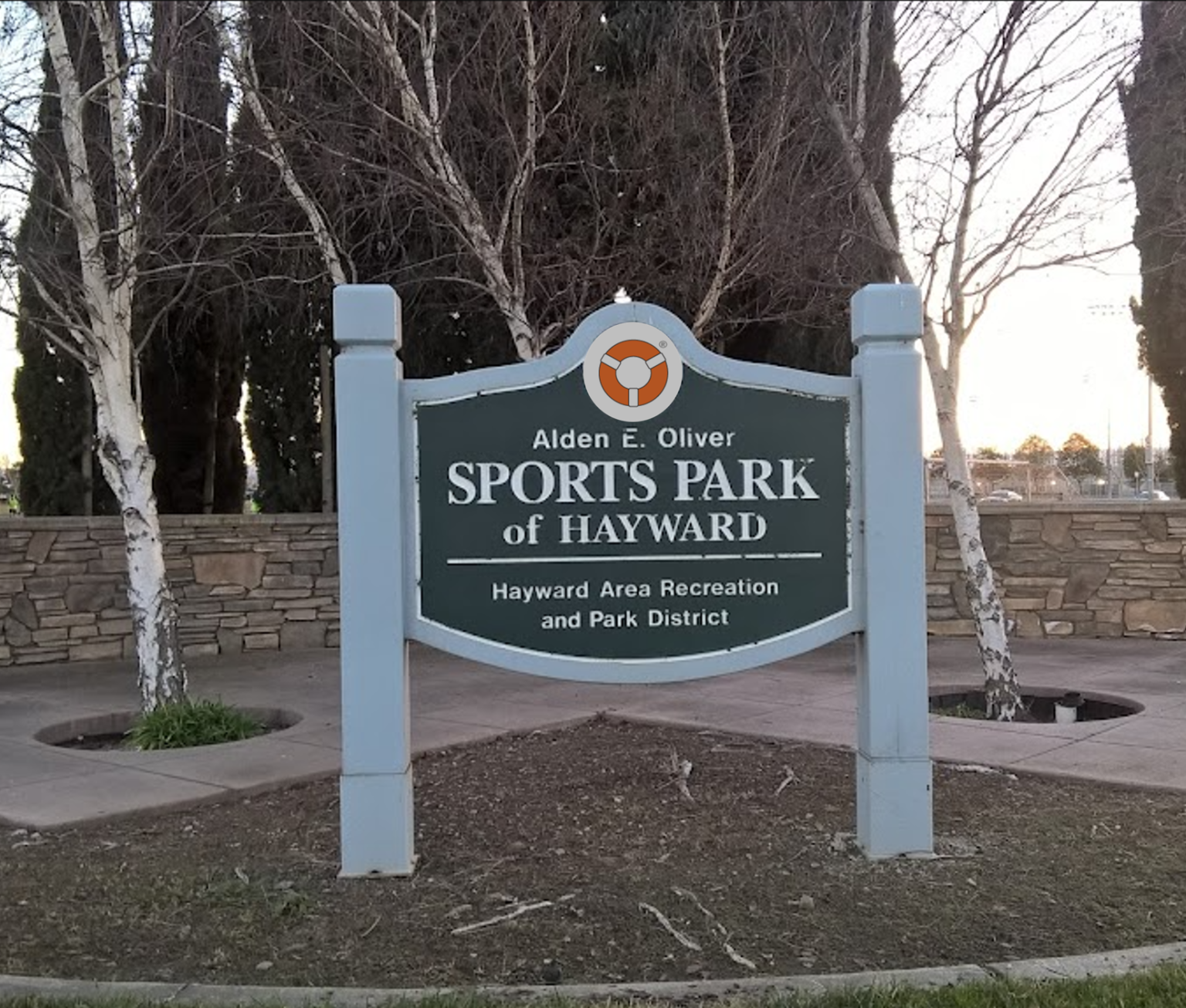 image of lifering secular recovery icon on Alden Oliver Park of Hayward California sign