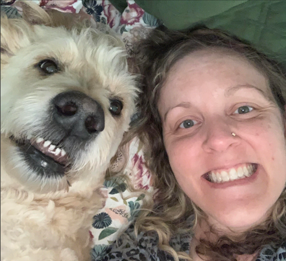 Headshot of LifeRing Annual Conference Keynote Speaker Jill Amos and golden doodle doggie Kya